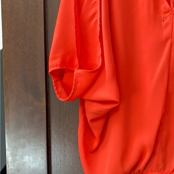 XOXO red/orange blouson top with criss-cross detail on back. - Picture 5 of 7